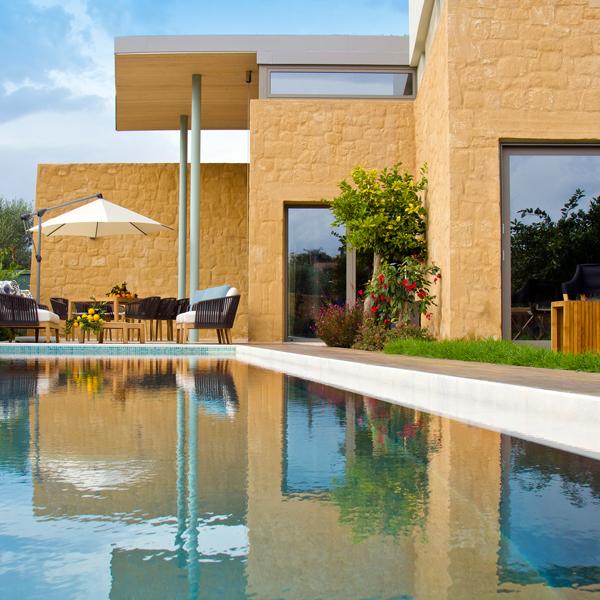 Ferienhaus kreta Luxusvilla mieten griechenland privater pool meerblick sandstrand finest greek villas ornella