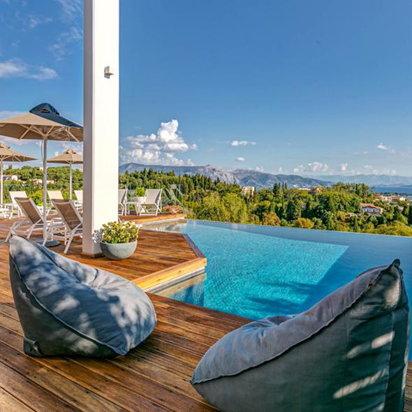 Ferienhaus korfu Luxusvilla mieten griechenland privat pool meerblick sandstrand finest greek villas exklusiv modern seafront modern gehoben premium traumhaft sandstrand luxusreisen