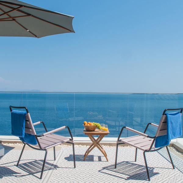 Ferienhaus korfu Luxusvilla mieten griechenland privat pool meerblick sandstrand finest greek villas exklusiv modern seafront modern gehoben premium traumhaft sandstrand luxusreisen