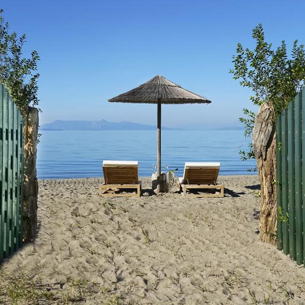 Korfu Luxusvilla Ferienhaus mieten griechenland privat pool meerblick sandstrand exklusiv modern seafront modern gehoben premium traumhaft sandstrand luxusreisen