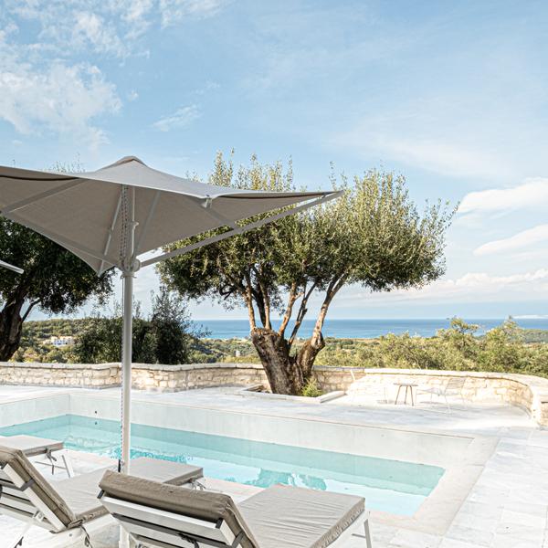 Korfu Luxusvilla Ferienhaus mieten griechenland privat pool meerblick sandstrand exklusiv modern seafront modern gehoben premium traumhaft sandstrand luxusreisen